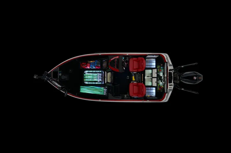 Slide: The Image of 2025 Ranger Z520 boat interior with dual Garmin displays and steering wheel in a garage setting. - 11
