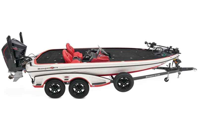 Slide: The Image of 2025 Ranger Z520 boat interior with blue and gray seats in a garage setting. - 7