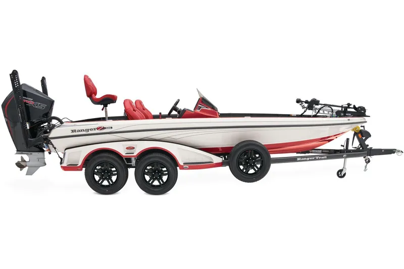 Slide: The Image of 2025 Ranger Z520 boat interior with fishing seat and trolling motor in a garage. - 9