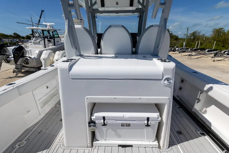 Slide: The Image of 2025 Sea Fox 328 Commander boat interior with Yeti cooler and seating. - 12