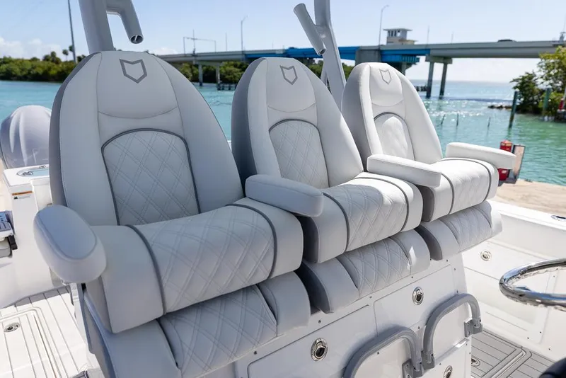 Slide: The Image of Luxurious seating on 2025 Sea Fox 328 Commander boat, featuring elegant design and waterfront view. - 15