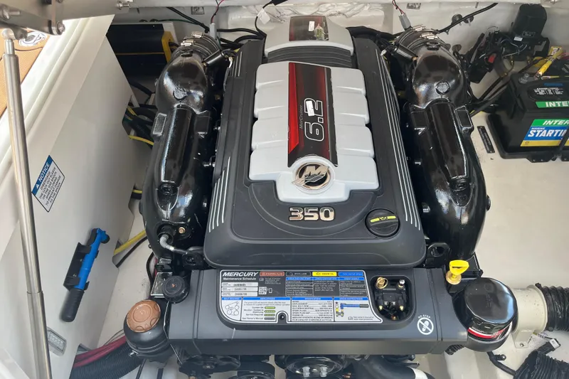 Slide: The Image of 2025 Chaparral 267 SSX boat engine, featuring a powerful 6.2L Mercury 350 horsepower motor. - 19
