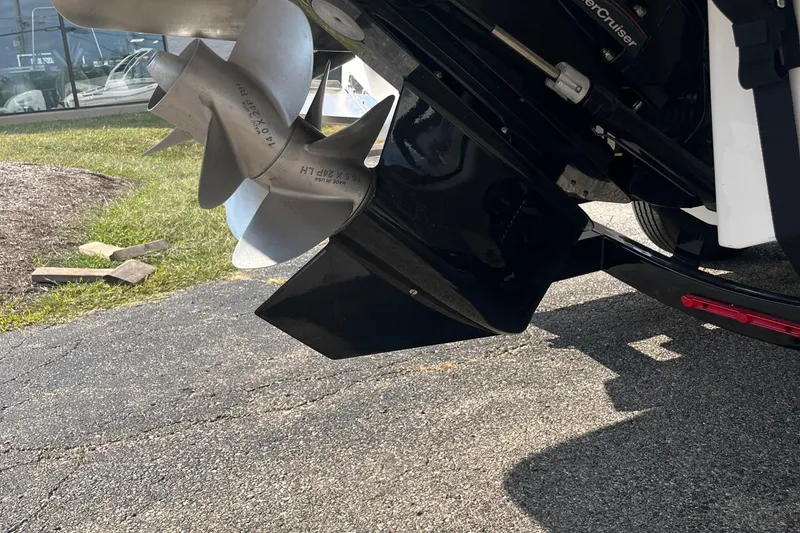 Slide: The Image of 2025 Chaparral 267 SSX boat propeller and drive system on pavement. - 21
