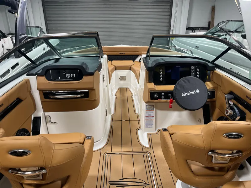 Slide: The Image of Luxurious interior of 2025 Chaparral 267 SSX boat with tan leather seating. - 3