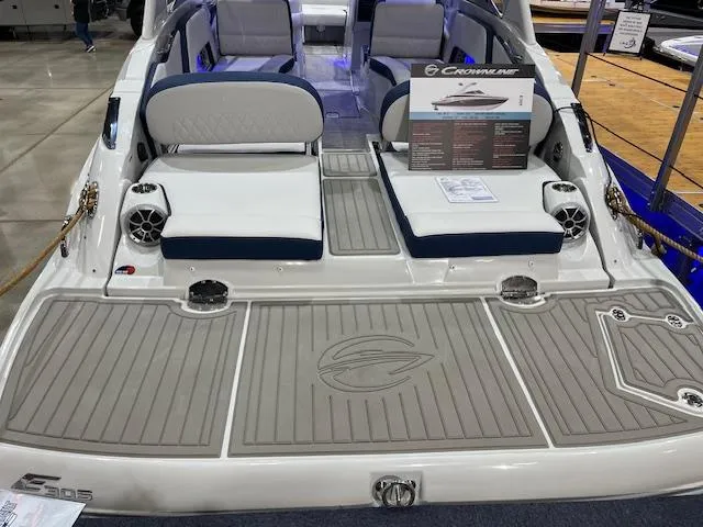 Slide: The Image of 2025 Crownline Eclipse E305 boat with spacious seating and modern design. - 1