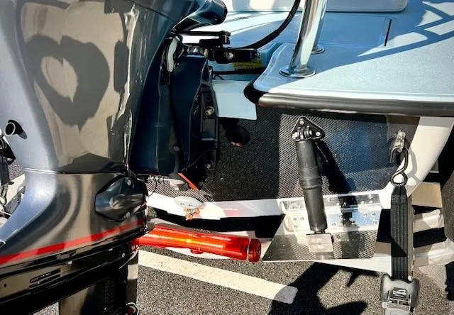 Slide: The Image of 2024 Chittum Skiffs 18 Islamorada boat engine and transom detail. - 5