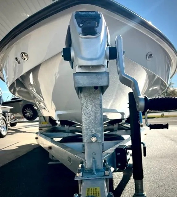 Slide: The Image of 2024 Chittum Skiffs 18 Islamorada boat on trailer, close-up view. - 9