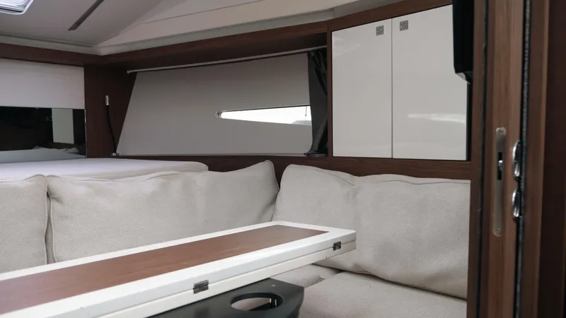 Slide: The Image of Interior of 2019 Jeanneau Leader 33 yacht with cozy seating and modern cabinetry. - 11