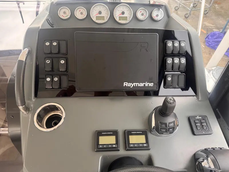 Slide: The Image of Control panel of 2019 Jeanneau Leader 33 with Raymarine navigation system. - 2