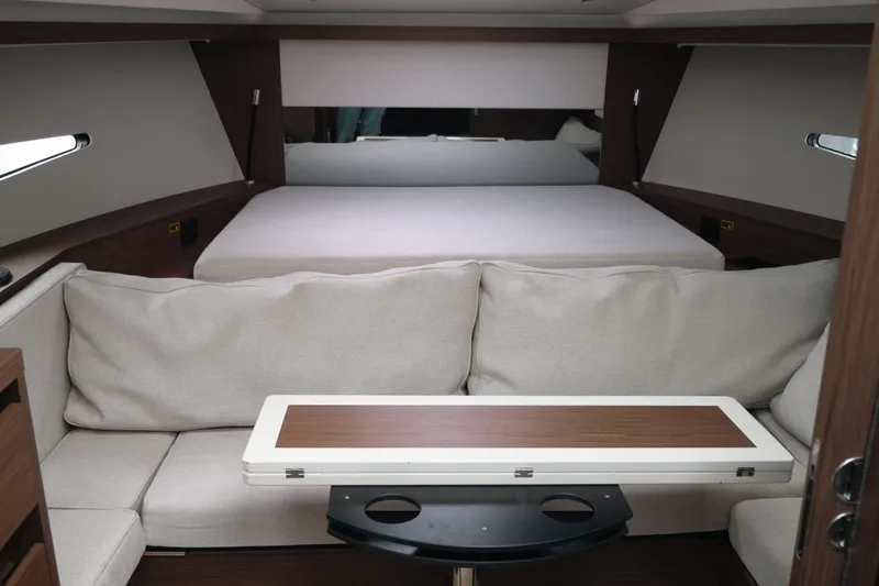 Slide: The Image of Interior of 2019 Jeanneau Leader 33 yacht with cozy seating and convertible table. - 9