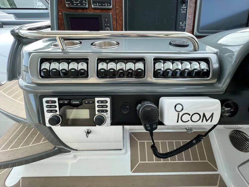 Slide: The Image of Control panel of a 2014 Formula 45 Yacht with Icom radio equipment. - 13