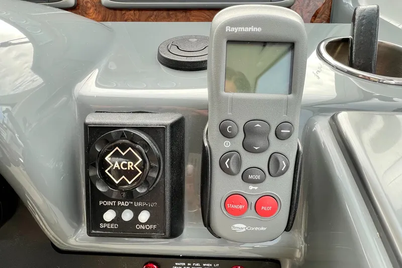 Slide: The Image of Control panel of a 2014 Formula 45 Yacht with Raymarine and ACR devices. - 14