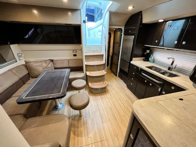 Slide: The Image of Interior of 2014 Formula 45 Yacht with modern kitchen and dining area. - 17