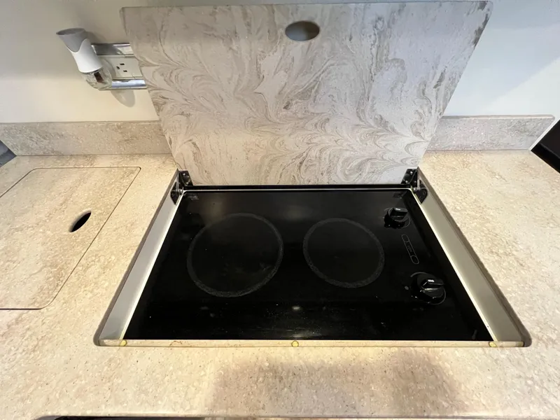 Slide: The Image of Stovetop on 2014 Formula 45 Yacht with marble-patterned cover. - 20