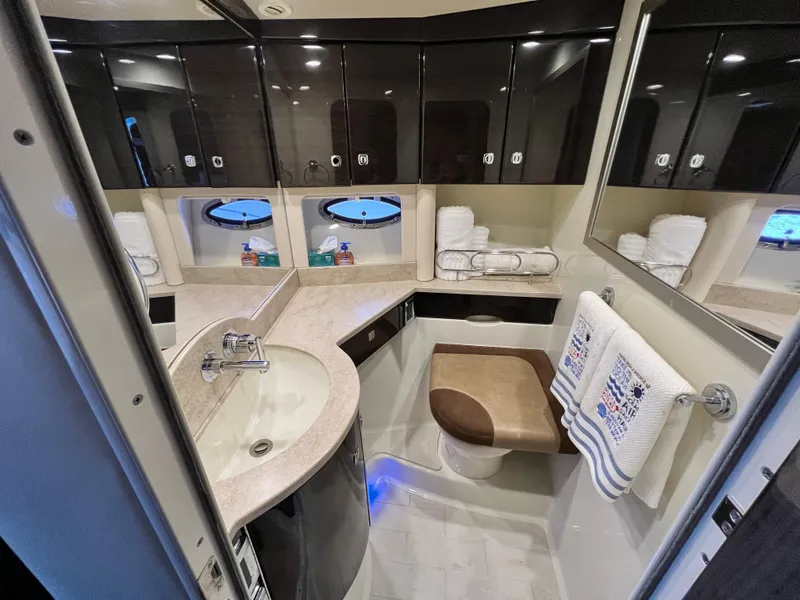 Slide: The Image of Luxurious bathroom in 2014 Formula 45 Yacht with modern fixtures and ample storage. - 25