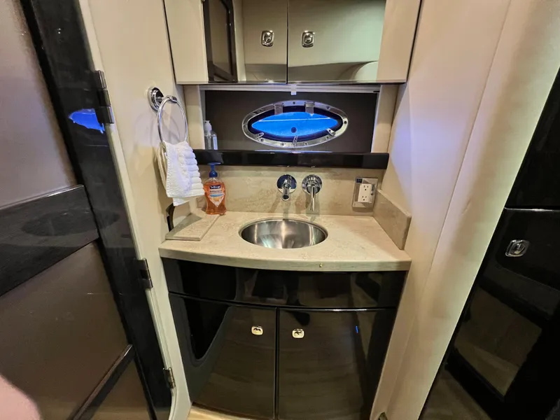 Slide: The Image of Luxurious bathroom sink area in 2014 Formula 45 Yacht with modern fixtures. - 28