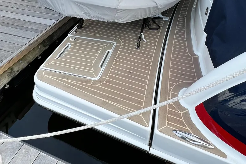 Slide: The Image of 2014 Formula 45 Yacht stern view with teak decking at dock. - 3