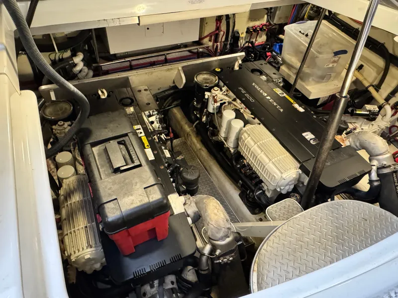 Slide: The Image of Engine room of 2014 Formula 45 Yacht, showcasing dual engines and mechanical components. - 33