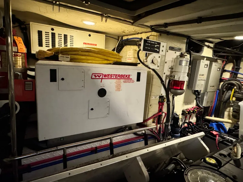 Slide: The Image of Engine room of 2014 Formula 45 Yacht with Westerbeke generator and electrical equipment. - 34