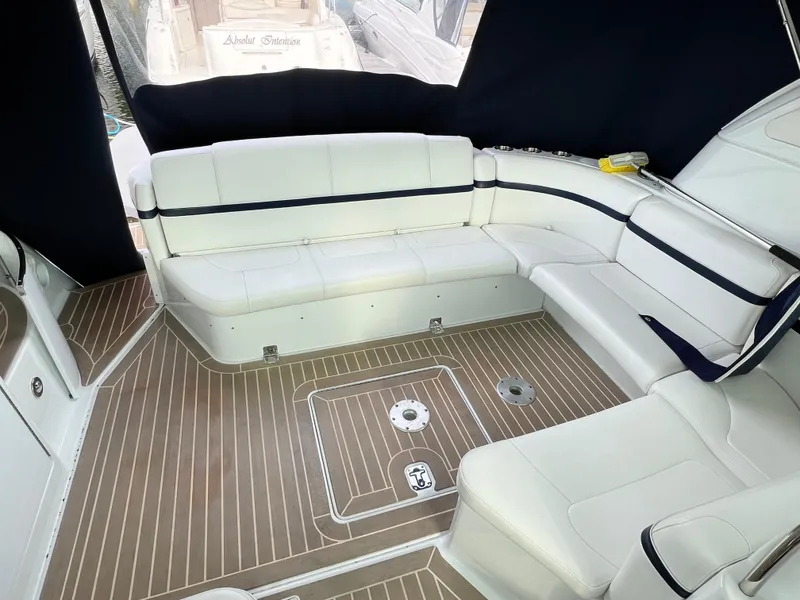 Slide: The Image of Interior of 2014 Formula 45 Yacht with white seating and wood flooring. - 4