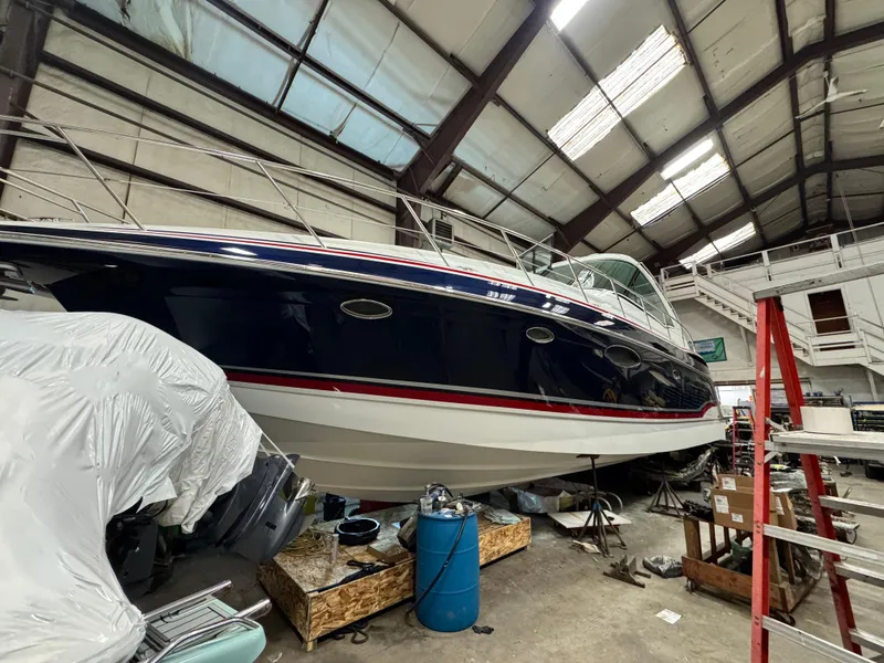 Slide: The Image of 2014 Formula 45 Yacht in storage, indoor facility, side view. - 41