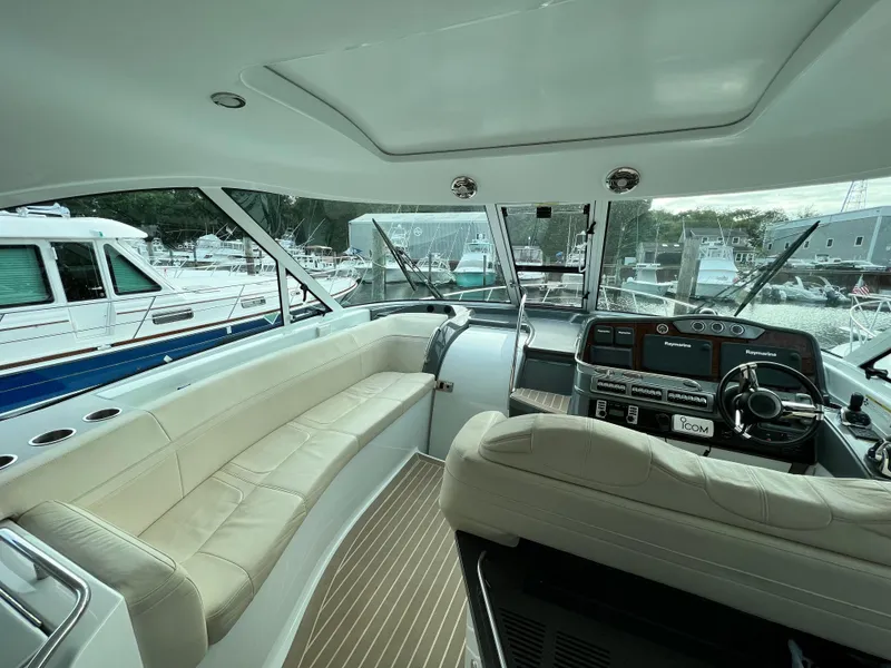 Slide: The Image of Interior of 2014 Formula 45 Yacht with beige seating and modern dashboard. - 7