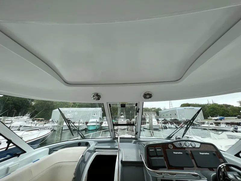 Slide: The Image of Interior view of 2014 Formula 45 Yacht cockpit with navigation controls. - 8
