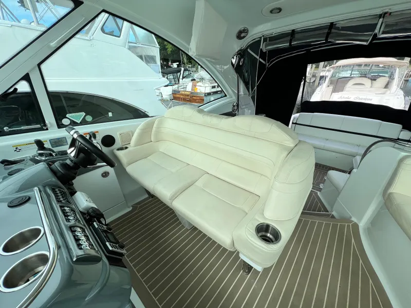 Slide: The Image of Interior of 2014 Formula 45 Yacht with beige seating and modern dashboard. - 9