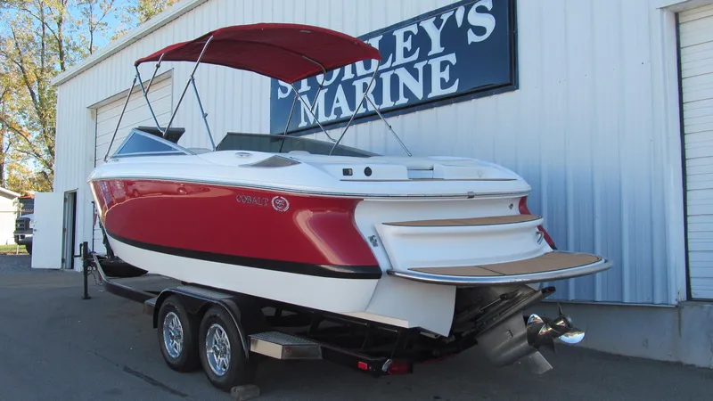 Slide: The Image of Red 2006 Cobalt 250 boat on trailer at Sorley's Marine dealership. - 3