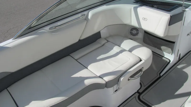 Slide: The Image of 2018 Cobalt 220S boat interior with white leather seating and modern design. - 8