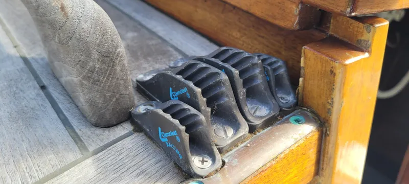 Slide: The Image of Close-up of Golant Gaffer Cutter Rig 2009 boat controls on wooden deck. - 21
