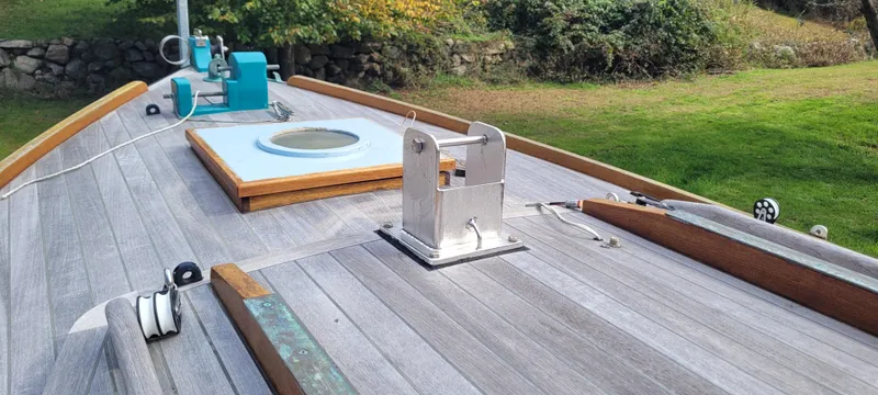 Slide: The Image of Wooden deck of a 2009 Golant Gaffer Cutter Rig sailboat with hatch and fittings. - 35