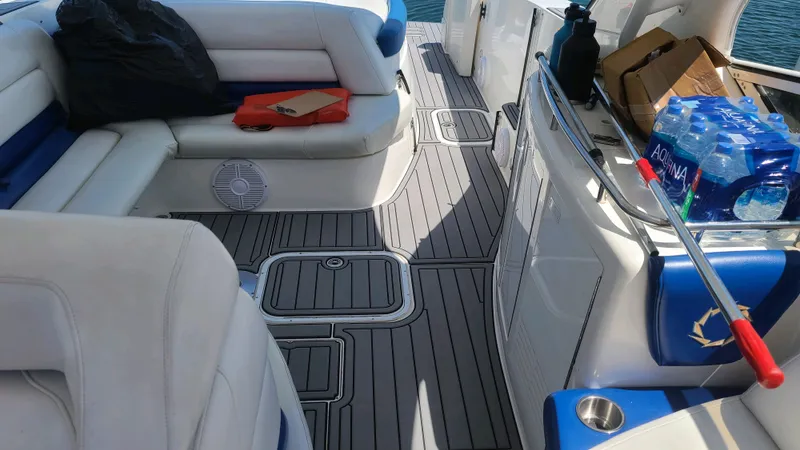 Slide: The Image of Interior of 2006 Fountain 48 Express Cruiser with seating and supplies on deck. - 17