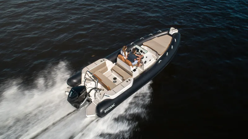 Slide: The Image of 2025 Zodiac Medline 7.5 boat cruising on open water, showcasing sleek design and performance. - 17