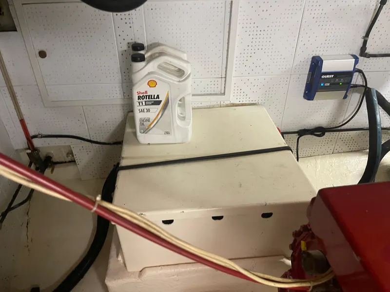 Slide: The Image of Engine room of 1988 Kadey-Krogen 42 with Shell Rotella oil container. - 36