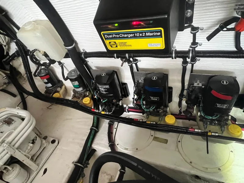 Slide: The Image of Engine compartment of 1997 Fountain 47' Lightning with Dual Pro Charger. - 19