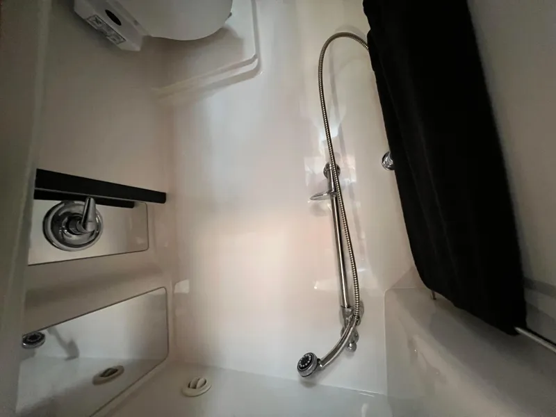 Slide: The Image of Interior of 2002 Regal Commodore 4260 yacht bathroom with shower and sink. - 31