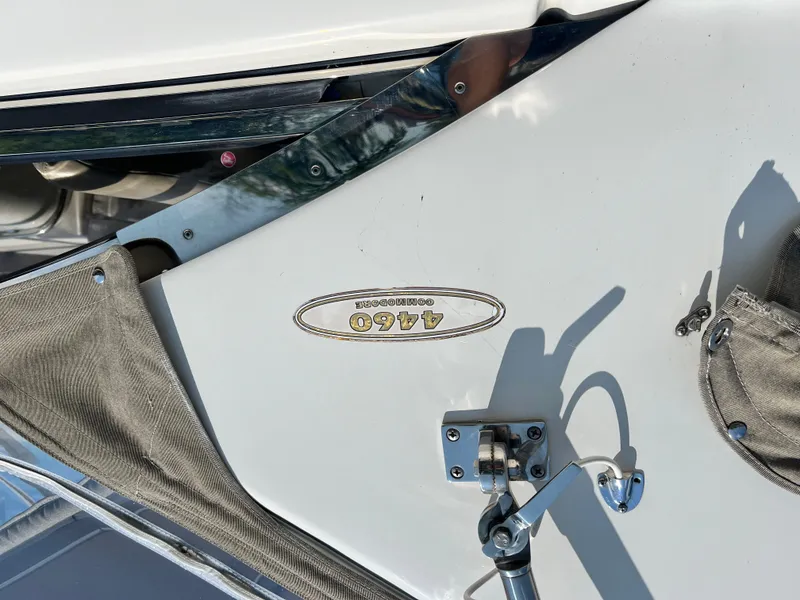 Slide: The Image of 2002 Regal Commodore 4260 boat detail with logo and hardware. - 4