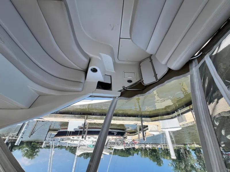 Slide: The Image of Interior view of a 2002 Regal Commodore 4260 boat with dockside scenery. - 8