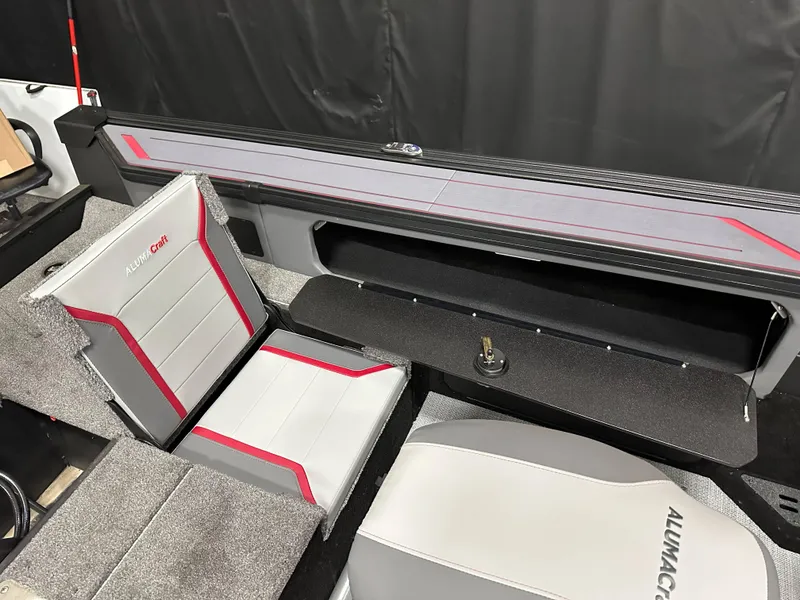 Slide: The Image of 2025 Alumacraft Trophy 175X Sport interior storage compartment with sleek design and modern features. - 27