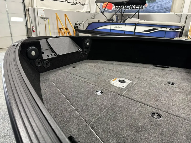 Slide: The Image of 2025 Alumacraft Trophy 175X Sport boat interior with speaker system and control panel. - 7