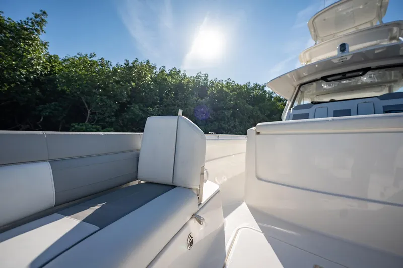 Slide: The Image of 2020 Pursuit S 408 Sport boat interior under sunny sky. - 24