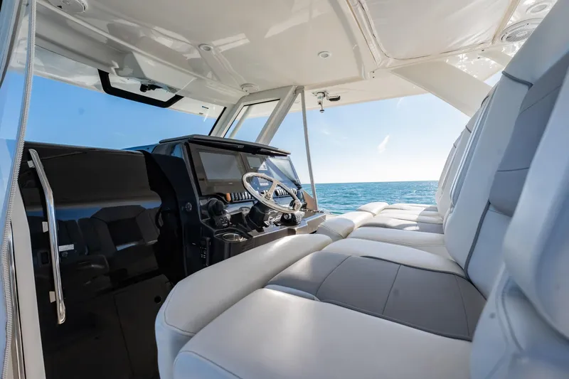 Slide: The Image of Interior of 2020 Pursuit S 408 Sport boat with ocean view. - 33