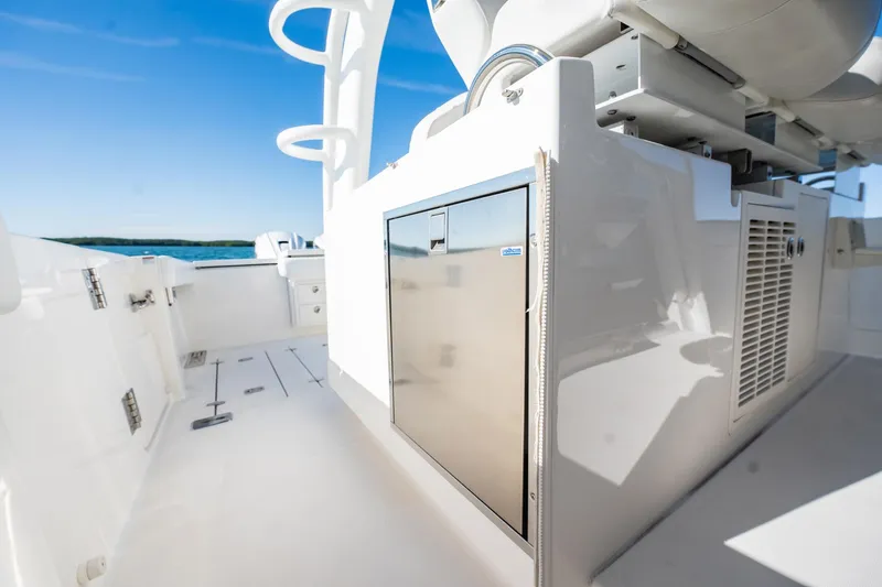 Slide: The Image of 2020 Pursuit S 408 Sport boat deck with sleek design and modern amenities. - 35