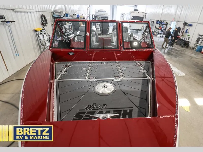 Slide: The Image of Red 2025 Evolution 221 boat interior at Bretz RV & Marine showroom. - 17