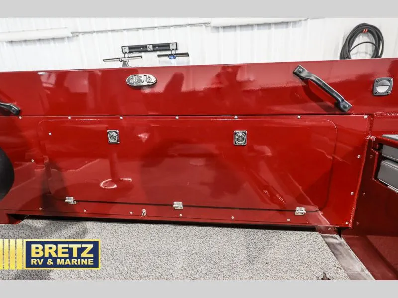 Slide: The Image of Red interior panel of a 2025 Evolution 221 boat at Bretz RV & Marine. - 22