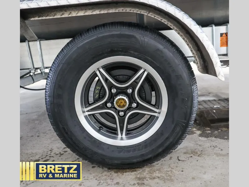 Slide: The Image of 2025 Evolution 221 wheel with alloy rim, showcased at Bretz RV & Marine. - 34