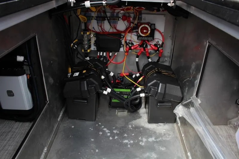 Slide: The Image of 2025 Montara Surf Boss CW 25' boat electrical system with batteries and wiring. - 8