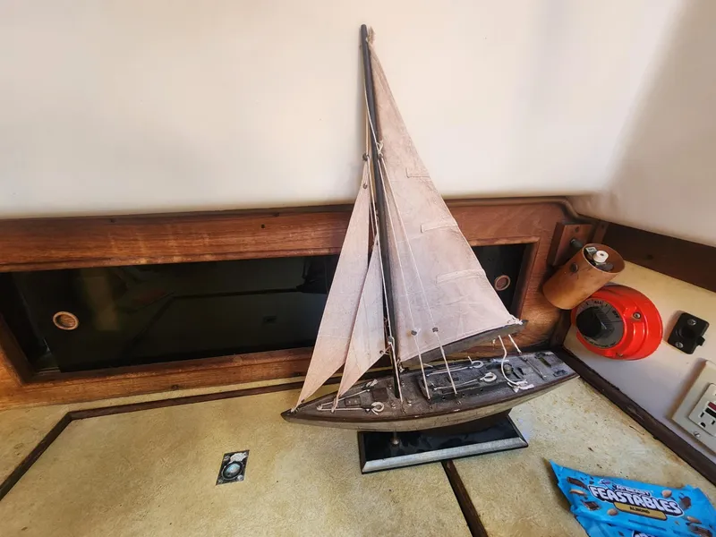 Slide: The Image of Model sailboat on a wooden shelf, Watkins 27 Pirate Ship, 1982. - 8