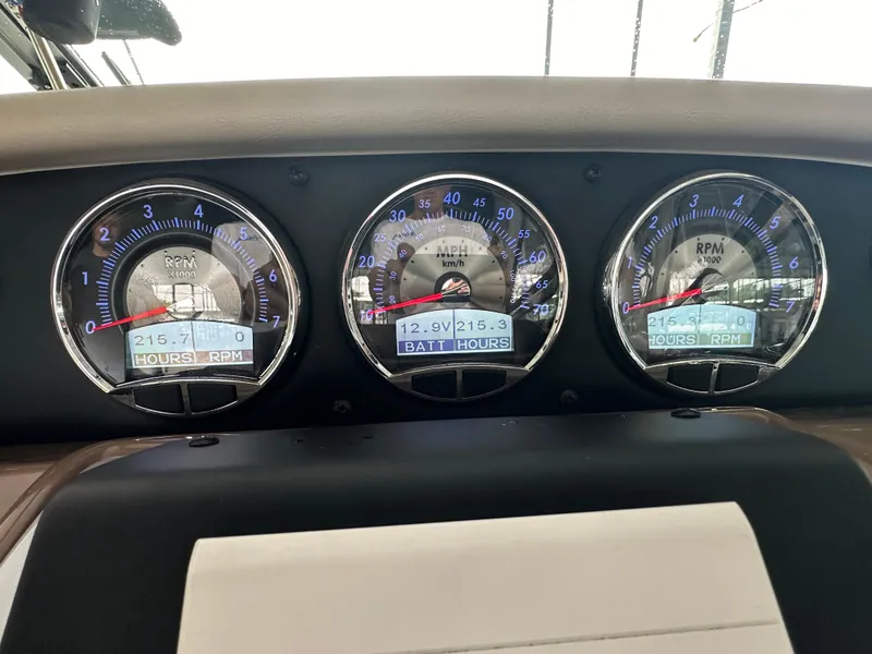 Slide: The Image of Dashboard gauges of a 2020 Crownline 330 SY boat, displaying RPM and battery hours. - 10